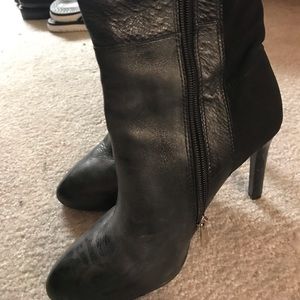 Black heel boots. Stretchy back. Size 7.5